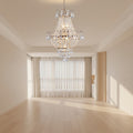 Modern living room with a chandelier, sofa, and coffee table.