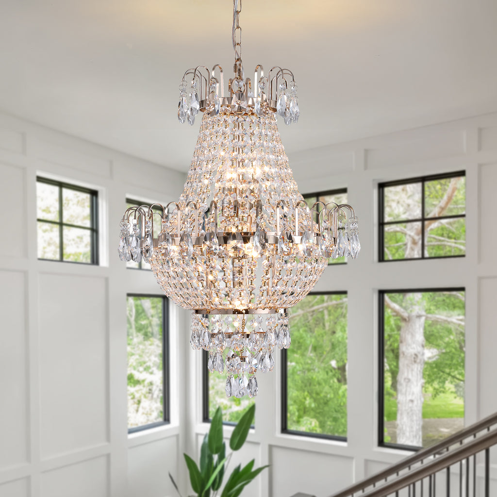 Crystal chandelier hanging in a room with large windows
