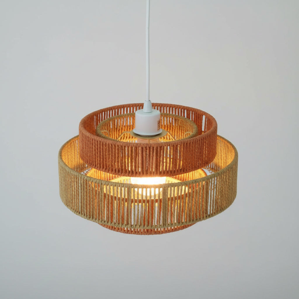Wicker lampshade with a white bulb on a white background