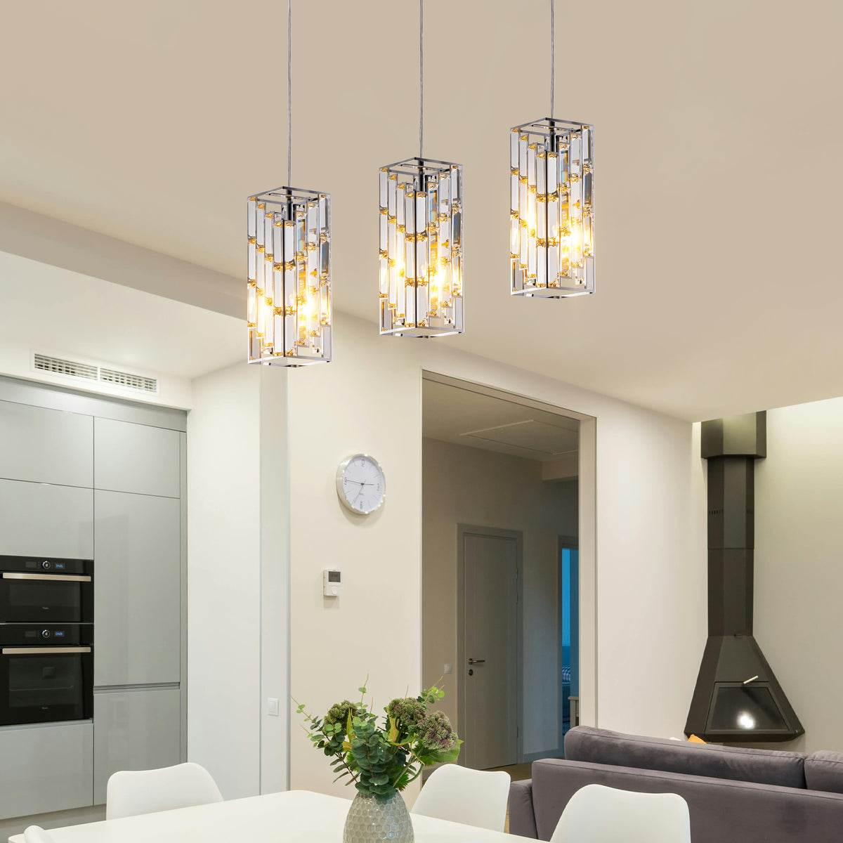 Modern kitchen with pendant lights hanging from the ceiling.